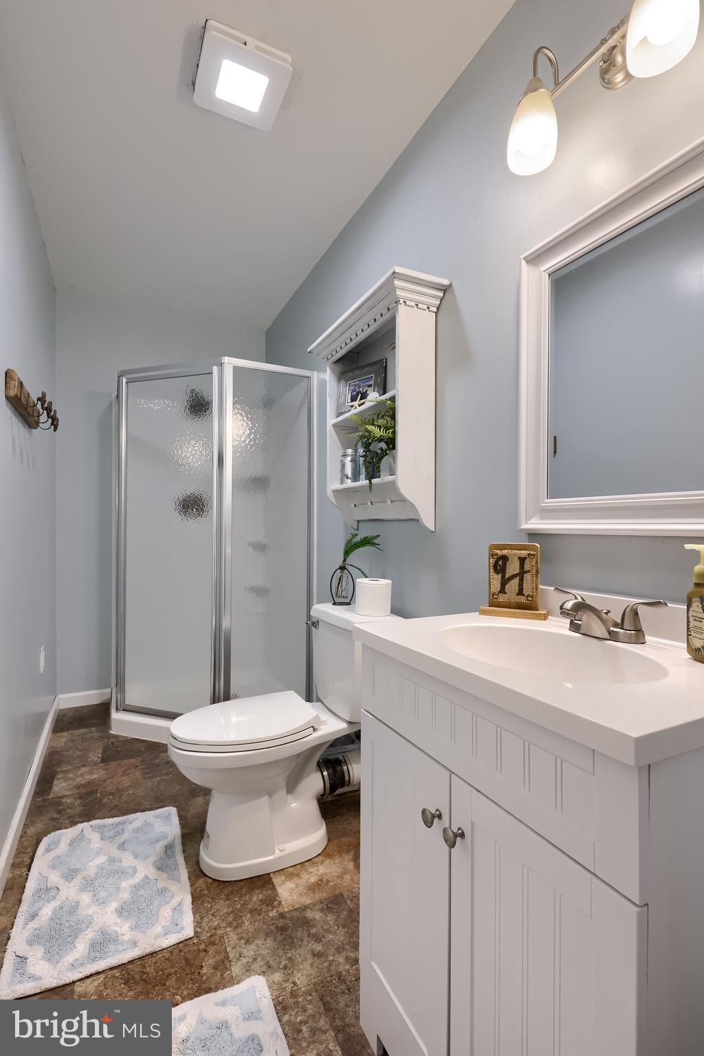 471 Shenks Ferry Road Conestoga, PA 17516 - Photo 75 of 105 a bathroom with a sink toilet and shower