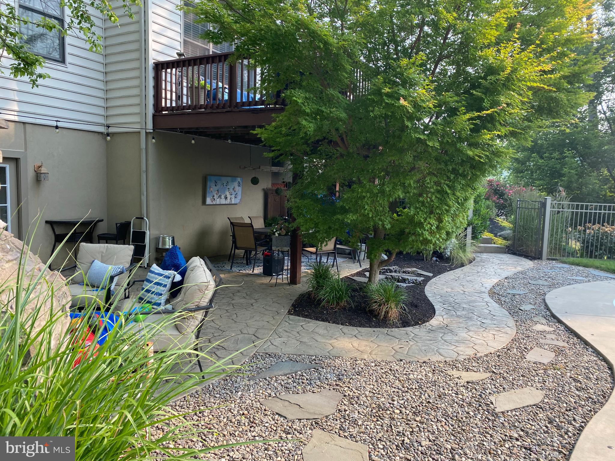 471 Shenks Ferry Road Conestoga, PA 17516 - Photo 86 of 105 a view of a chairs and table in backyard