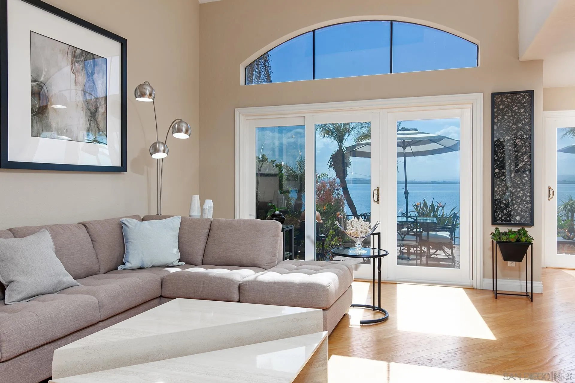 5 Aruba Bend Coronado, CA 92118 - Photo 11 of 40 a living room with furniture and a large window
