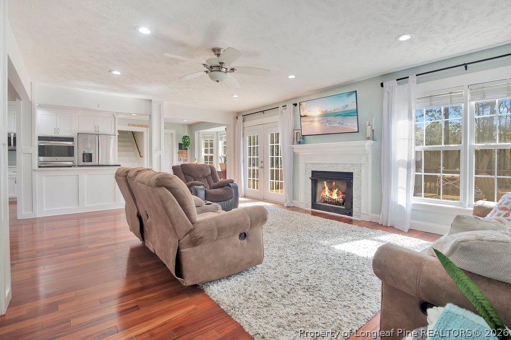419 Senter Lane Bunnlevel, NC 28323 - Photo 6 of 49 a living room with furniture and a fireplace