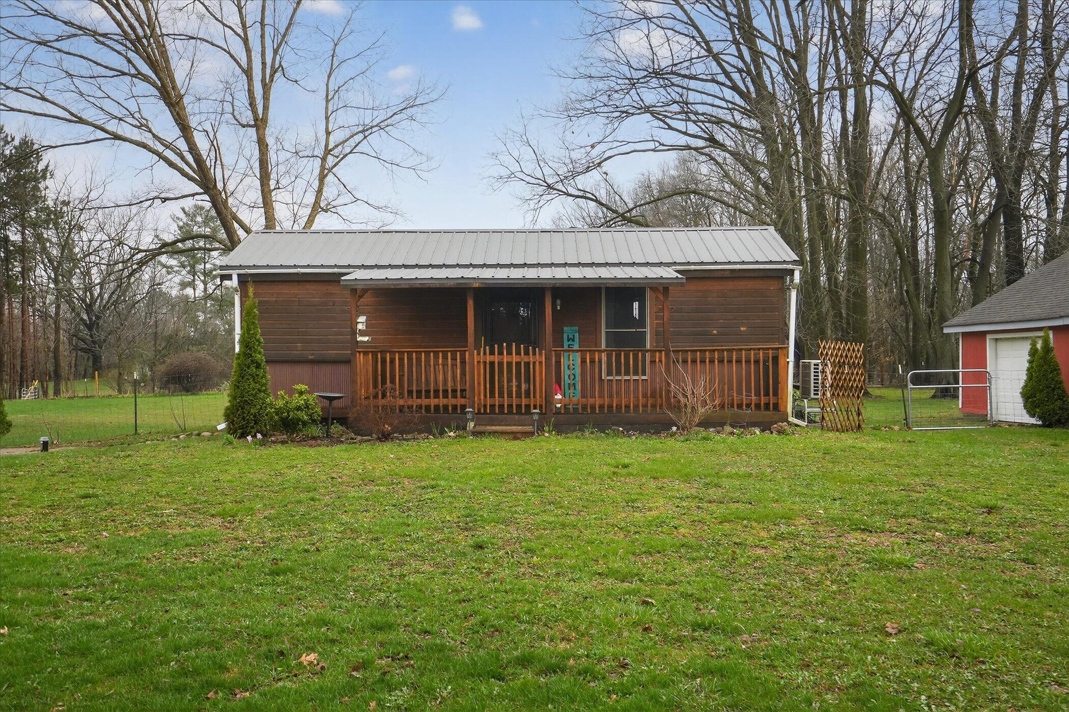 5135 11 MIle Road Burlington, MI 49029 - Photo 4 of 28 04-5135-11-MIle-Rd-WindowStill-Photograp