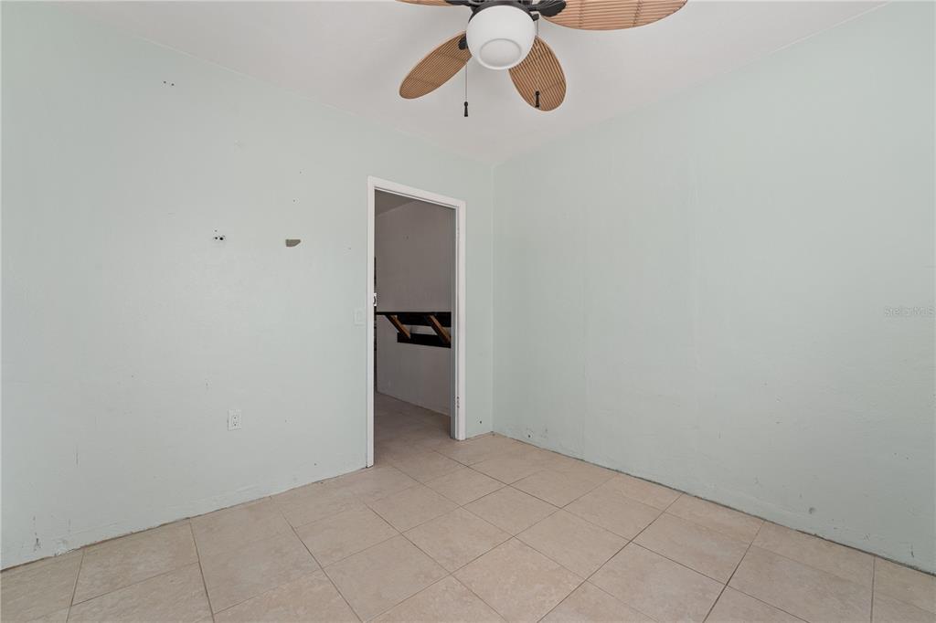 2600 1st Street Indian Rocks Beach, FL 33785 - Photo 16 of 40 a view of a room with a hanging space and dryer