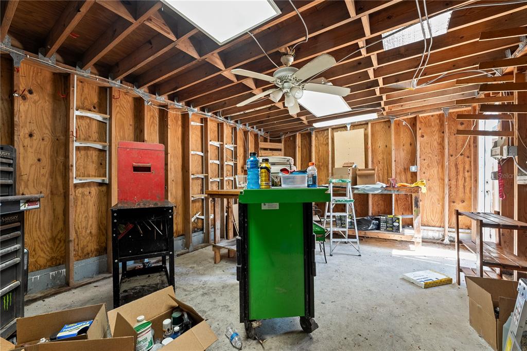 2600 1st Street Indian Rocks Beach, FL 33785 - Photo 22 of 40 a view of a porch with furniture and a shower