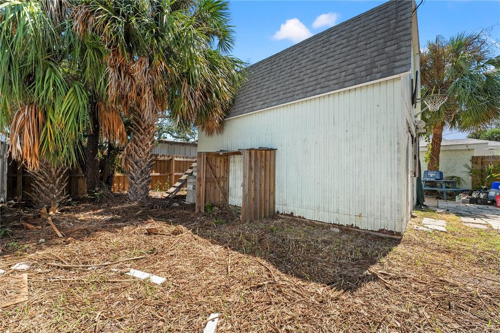 2600 1st Street Indian Rocks Beach, FL 33785 - Photo 29 of 40 a view of a house with a yard
