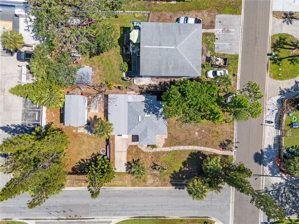 2600 1st Street Indian Rocks Beach, FL 33785 - Photo 32 of 40 an aerial view of a house with a yard and sitting area