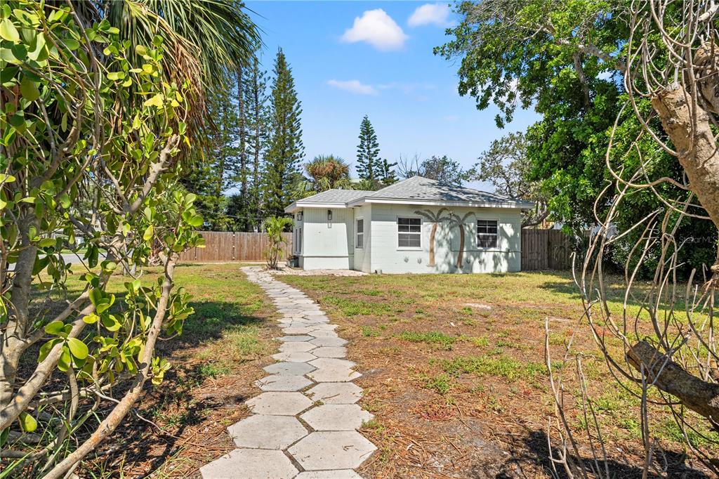 2600 1st Street Indian Rocks Beach, FL 33785 - Photo 36 of 40 a view of a house with a yard