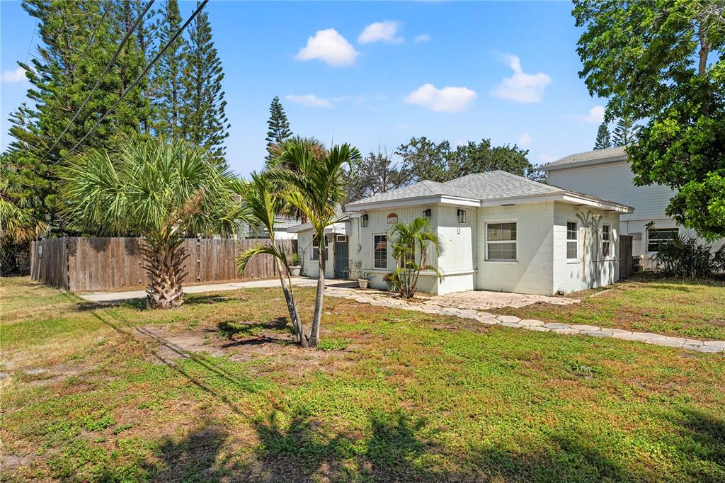 2600 1st Street Indian Rocks Beach, FL 33785 - Photo 37 of 40 a house with swimming pool in front of it