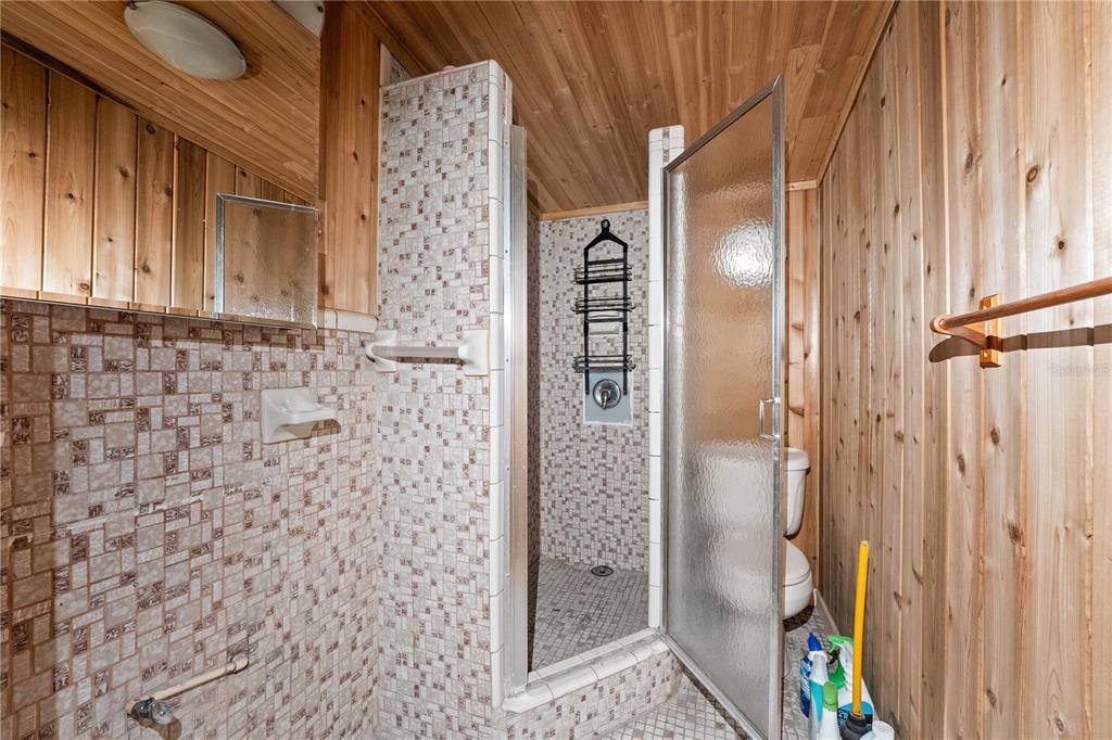 2600 1st Street Indian Rocks Beach, FL 33785 - Photo 8 of 40 a bathroom with a shower