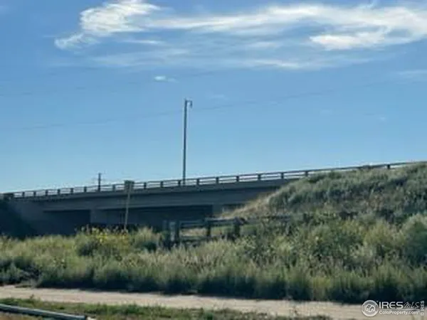 a view of a city with a bridge