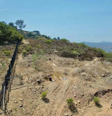 a view of a city with mountains in the background