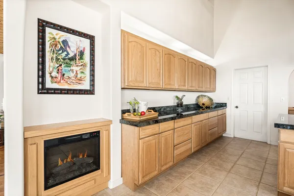 a kitchen with stainless steel appliances granite countertop a stove and a sink