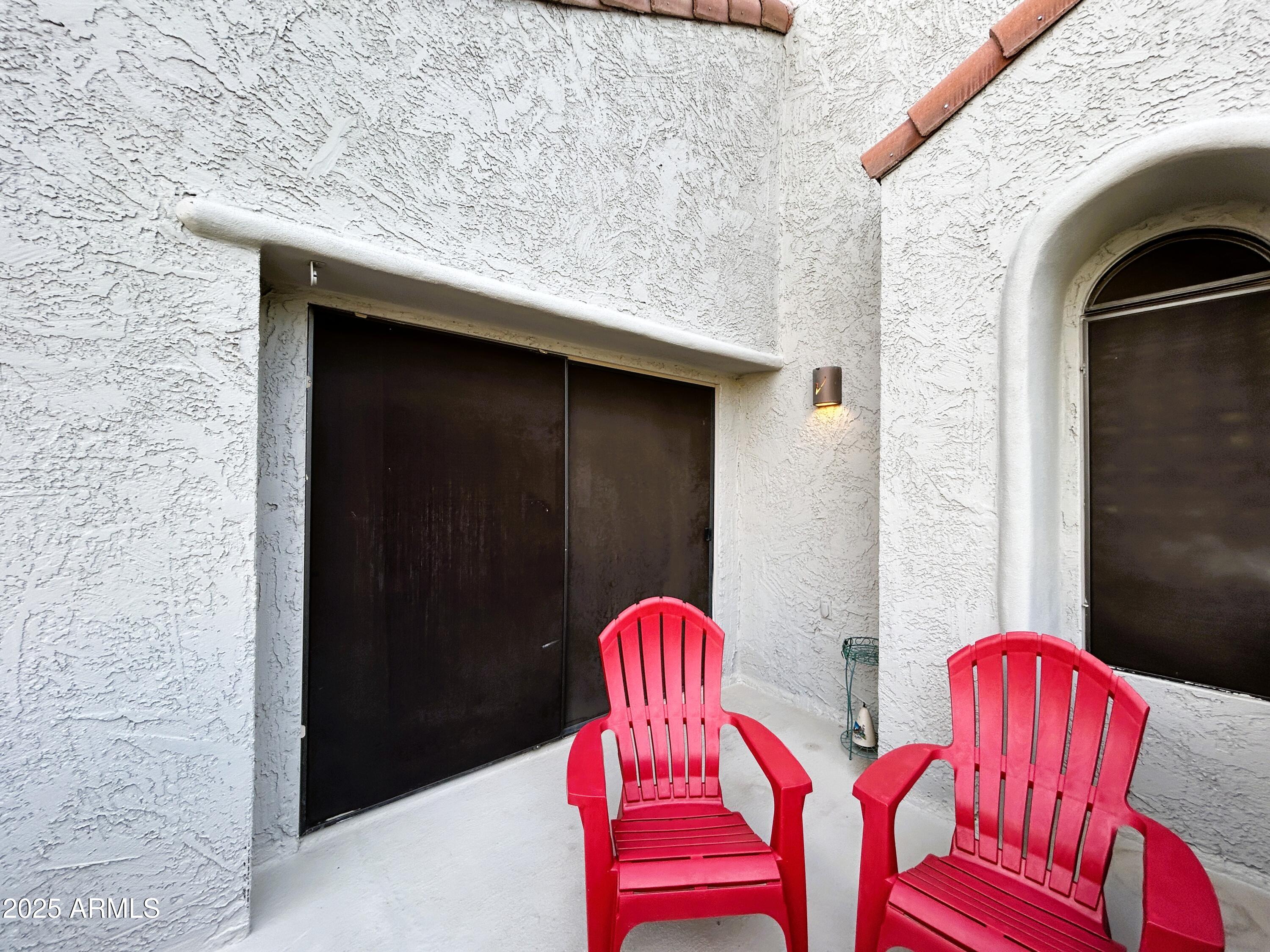 10055 East Mountainview Lake Drive, Unit 2059 Scottsdale, AZ 85258 - Photo 17 of 34 a view of balcony with two chairs