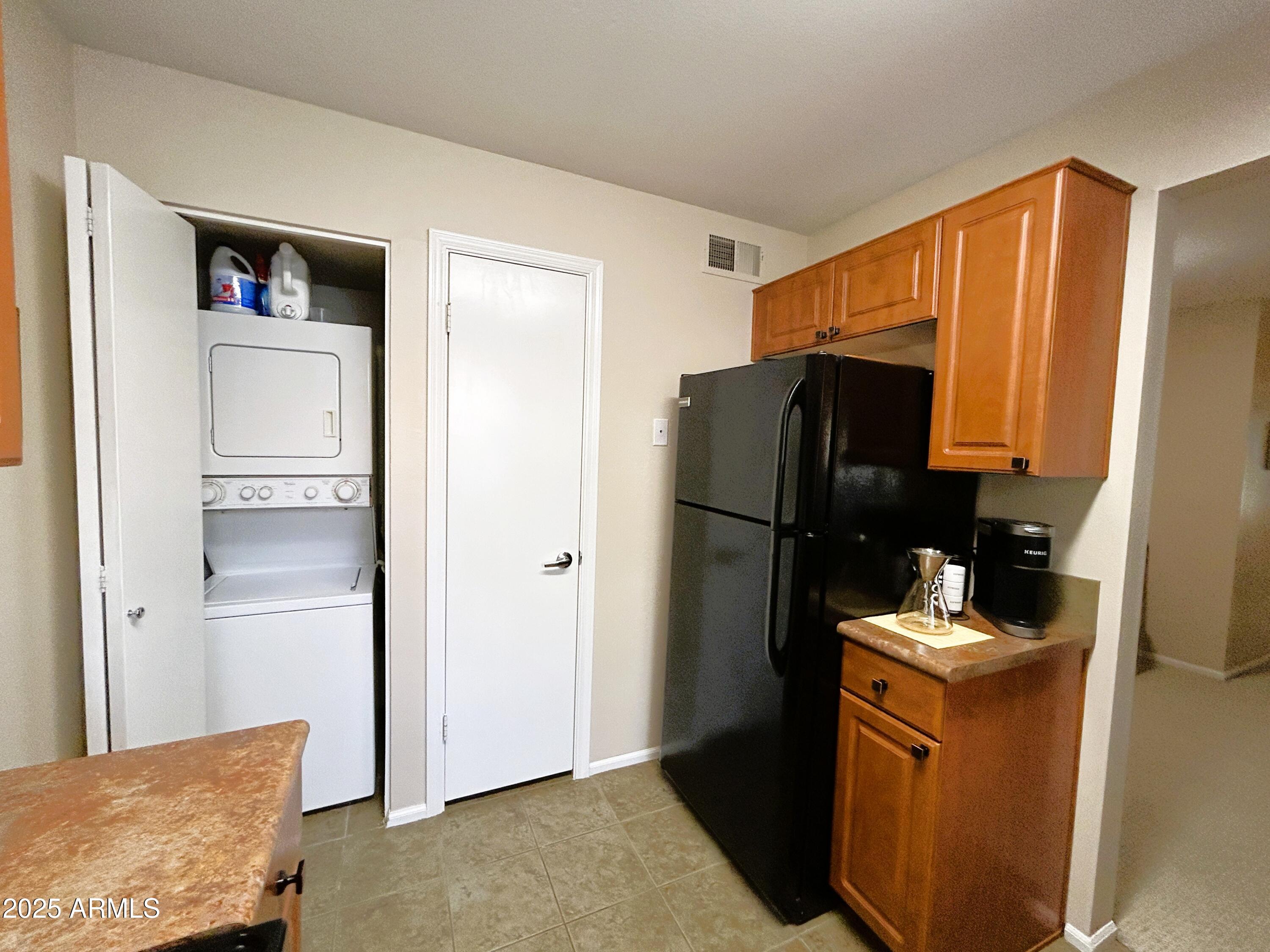 10055 East Mountainview Lake Drive, Unit 2059 Scottsdale, AZ 85258 - Photo 19 of 34 a room with storage and utility