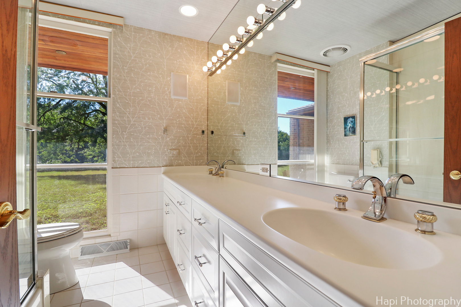 80 Meadow Hill Road Barrington Hills, IL 60010 - Photo 21 of 25 a bathroom with a granite countertop sink mirror and a bathtub