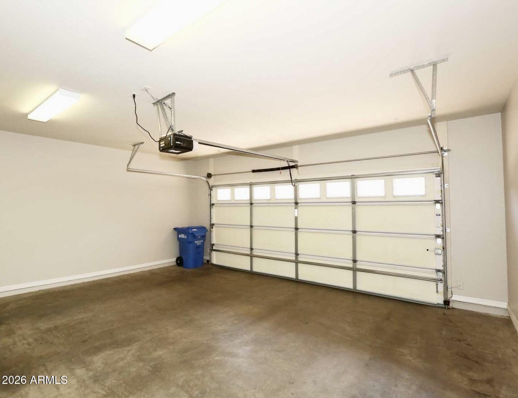 3935 East Rough Rider Road, Unit 1144 Phoenix, AZ 85050 - Photo 19 of 31 a view of a garage