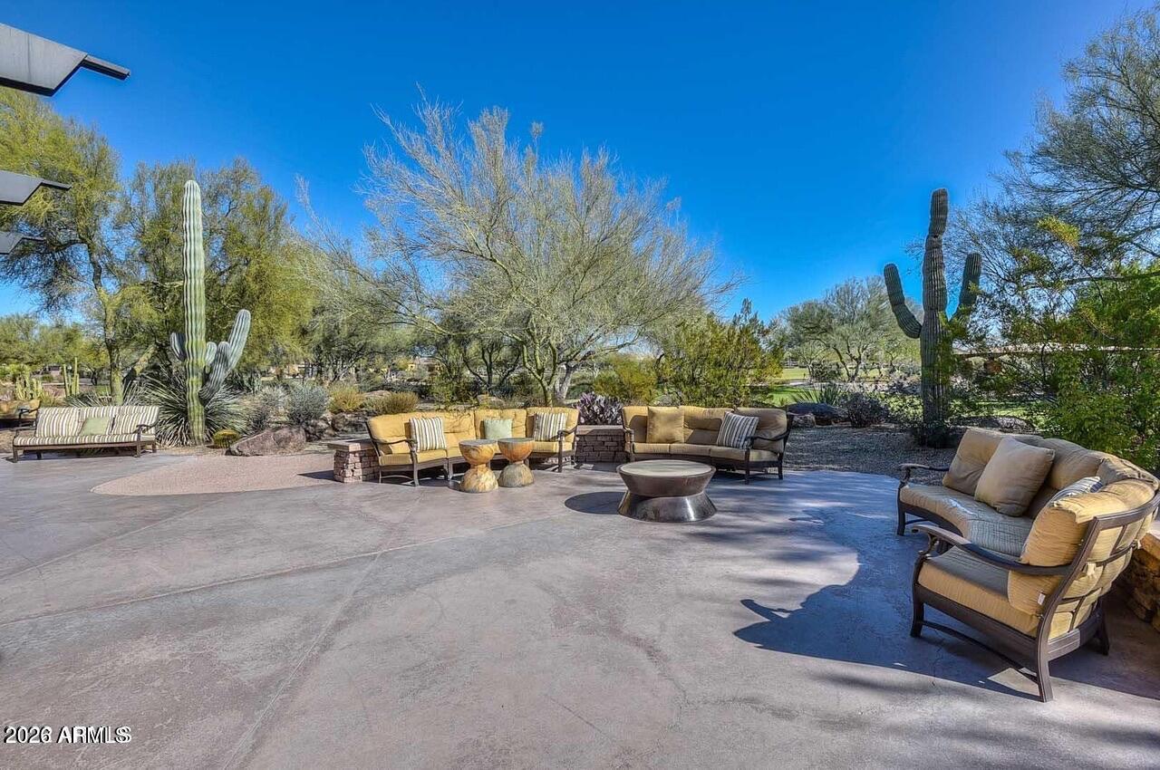 3935 East Rough Rider Road, Unit 1144 Phoenix, AZ 85050 - Photo 28 of 31 a view of a two couches in a patio