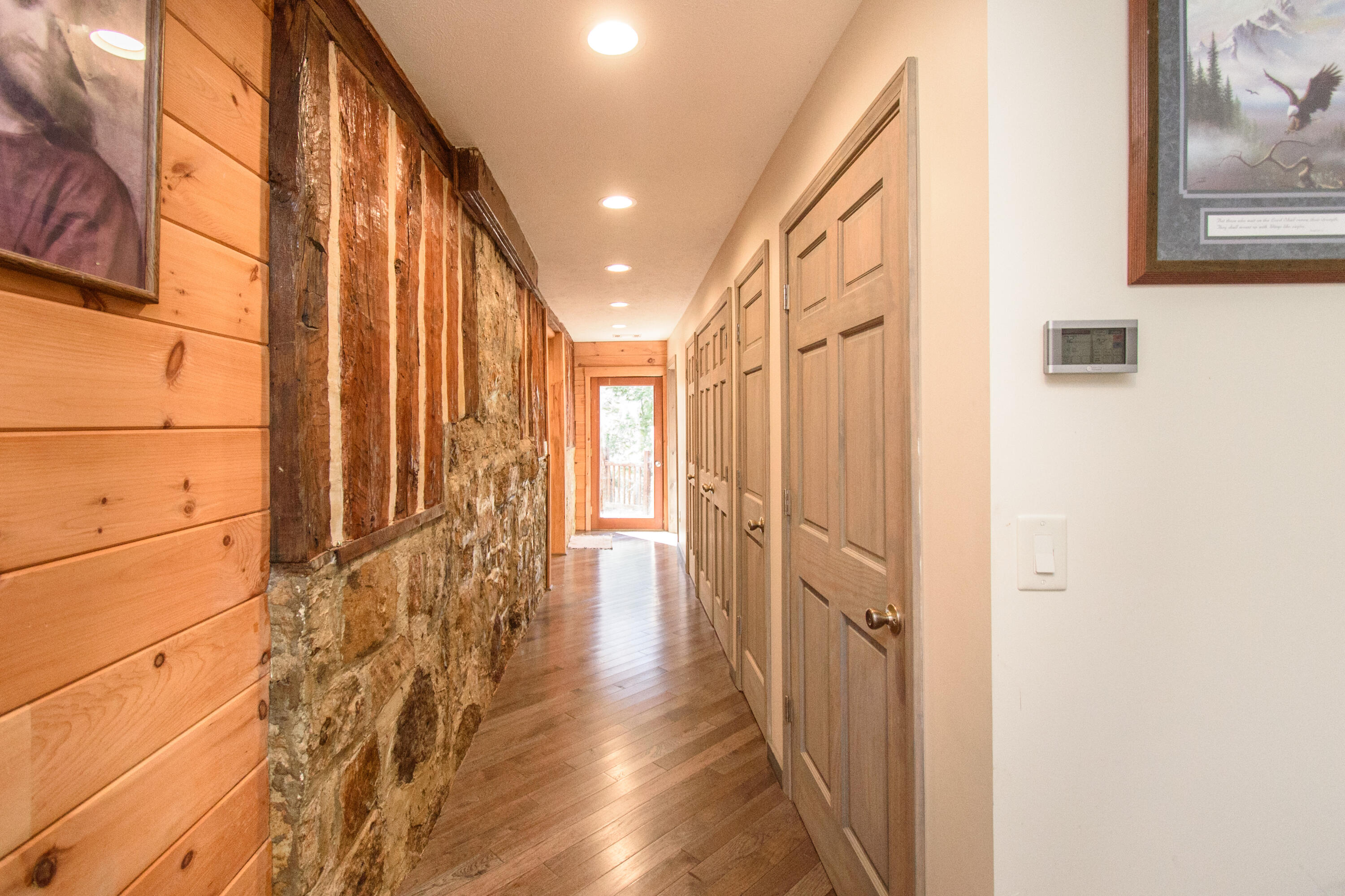 1804 Garlick Road Elliston, VA 24087 - Photo 8 of 95 a view of a hallway with wooden floor and a bathroom
