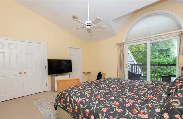 a bathroom with a bathtub sink and mirror
