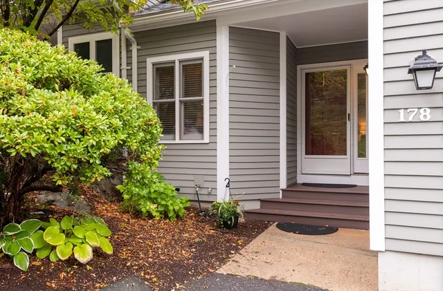 a view of a patio with couches chairs and table and chairs