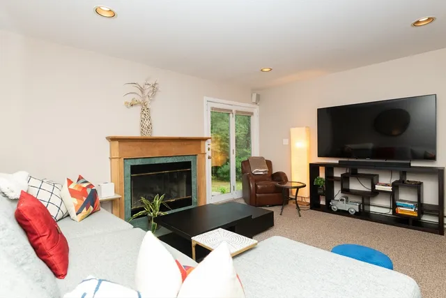 a view of a chairs and table in the balcony
