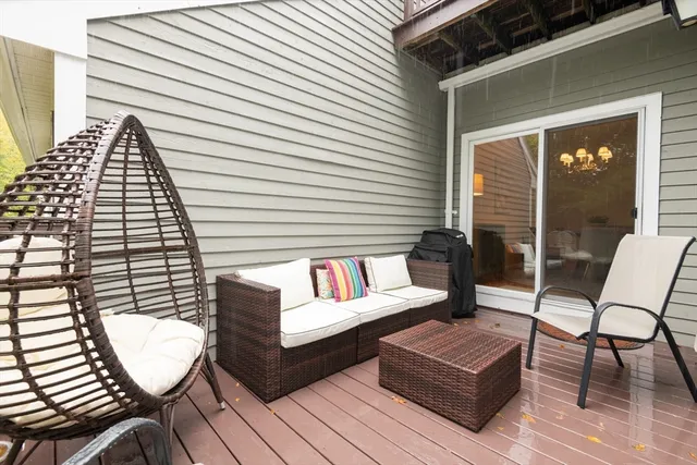 a kitchen with stainless steel appliances granite countertop a refrigerator sink and white cabinets