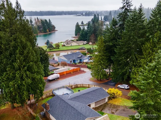 an aerial view of a pool patio swimming pool and outdoor seating