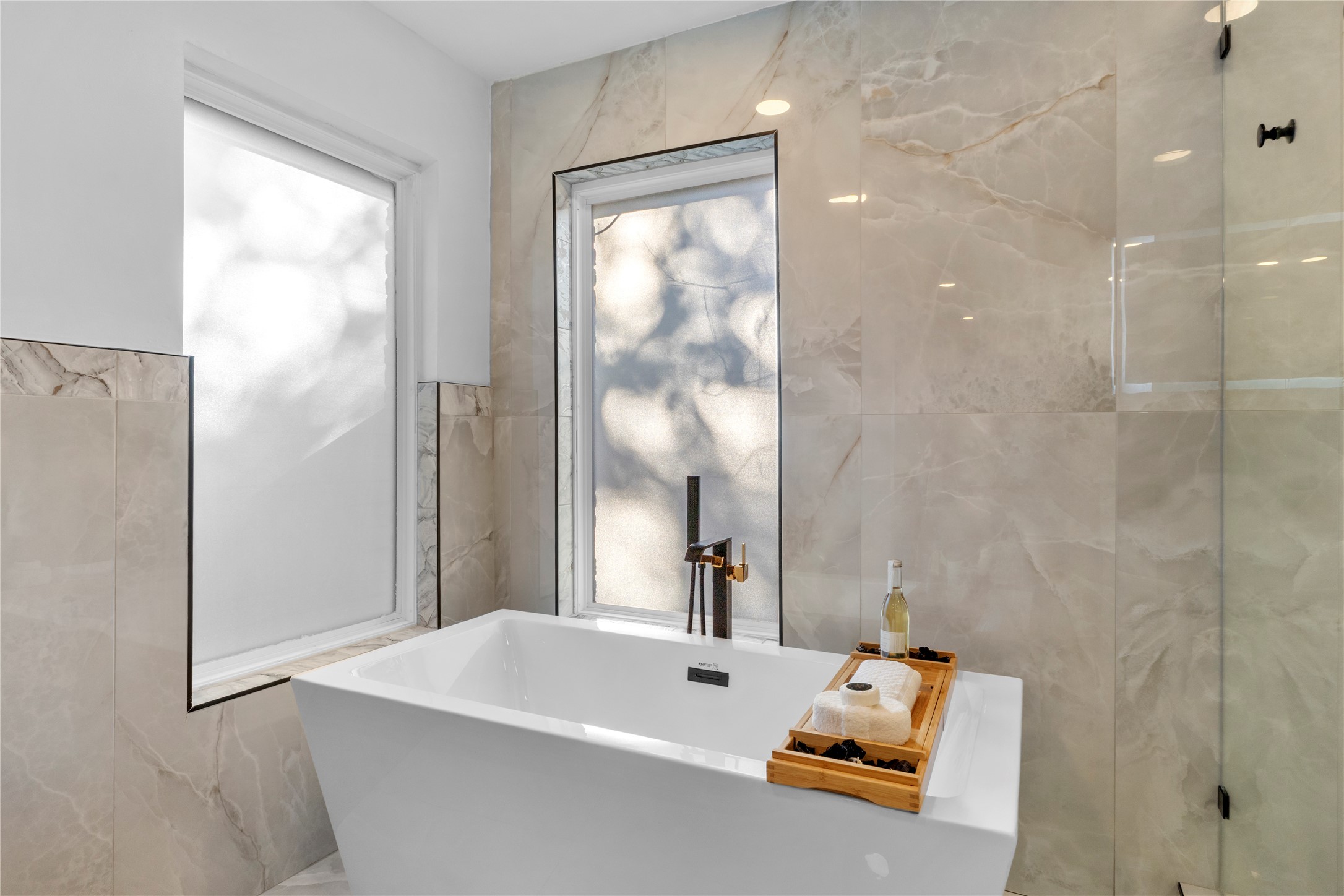 6604 Lexington Road Austin, TX 78757 - Photo 16 of 33 Primary bath with a soaking tub and separate walk in shower.