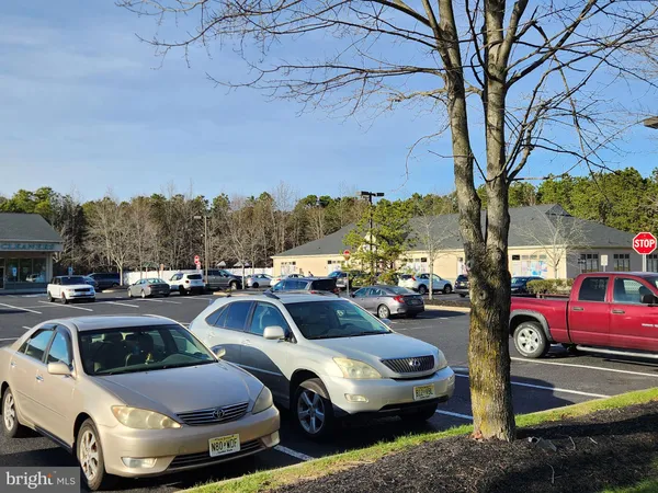 a view of cars parked in a parking lot