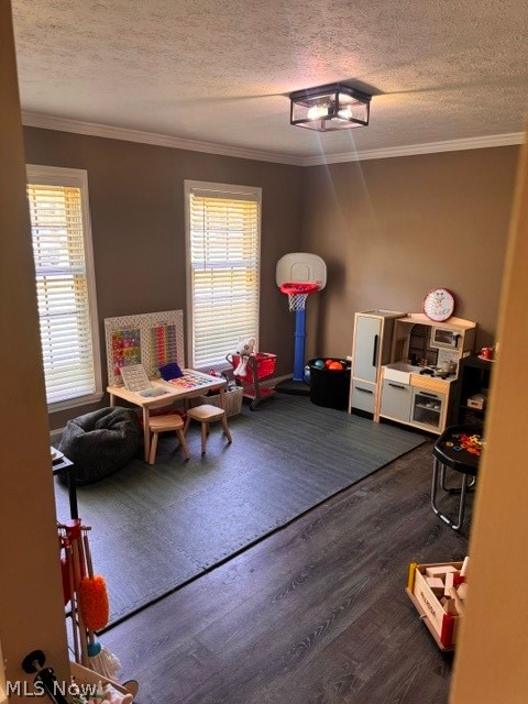 2760 Haines Road Madison, OH 44057 - Photo 11 of 33 Room with wood-finish flooring, two large windows with blinds, a modern flush-mount ceiling light fixture, and crown molding
