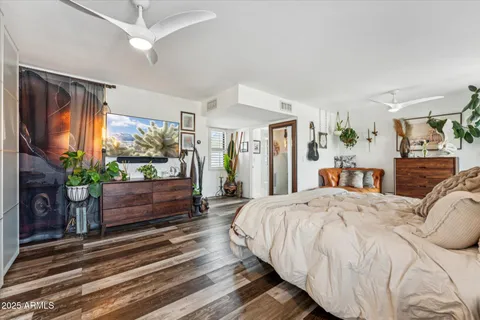 a bed room with a bed and a fireplace