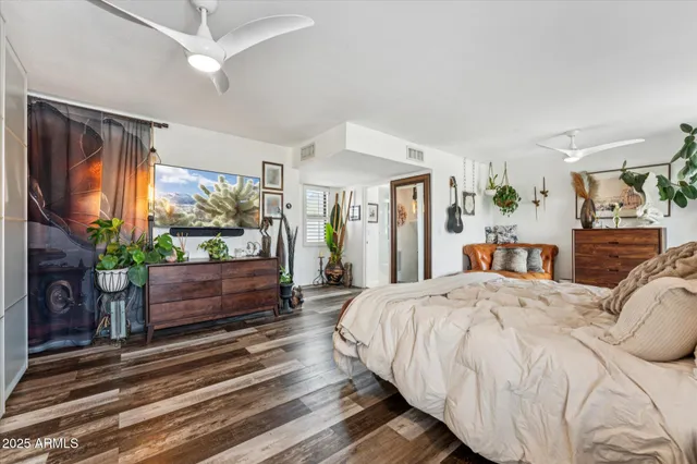 a bed room with a bed and a fireplace