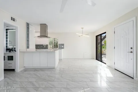 a view of a kitchen with a sink