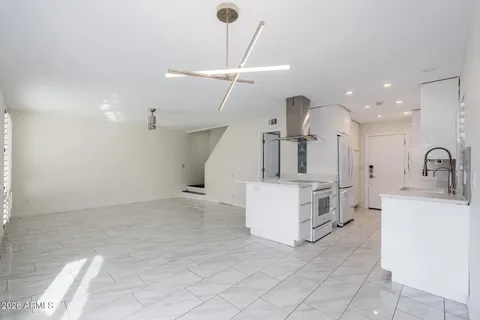 a view of kitchen and sink