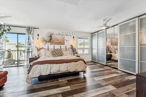 a bedroom with a bed and a walk in closet