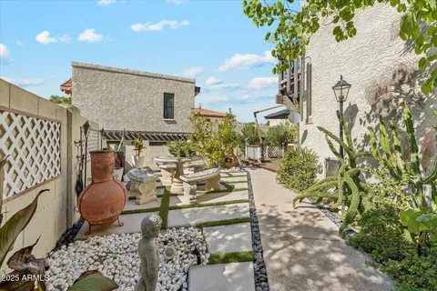 view of living room with patio furniture and a garden