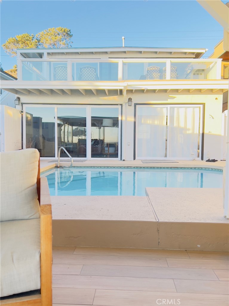 35091 Beach Road Dana Point, CA 92624 - Photo 19 of 27 a view of front door of a house with a window