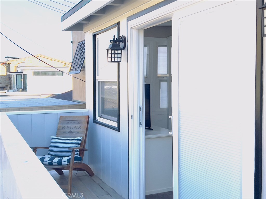 35091 Beach Road Dana Point, CA 92624 - Photo 5 of 27 a view of entryway and hall with wooden floor