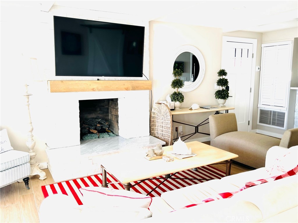 35091 Beach Road Dana Point, CA 92624 - Photo 9 of 27 a living room with furniture and a flat screen tv