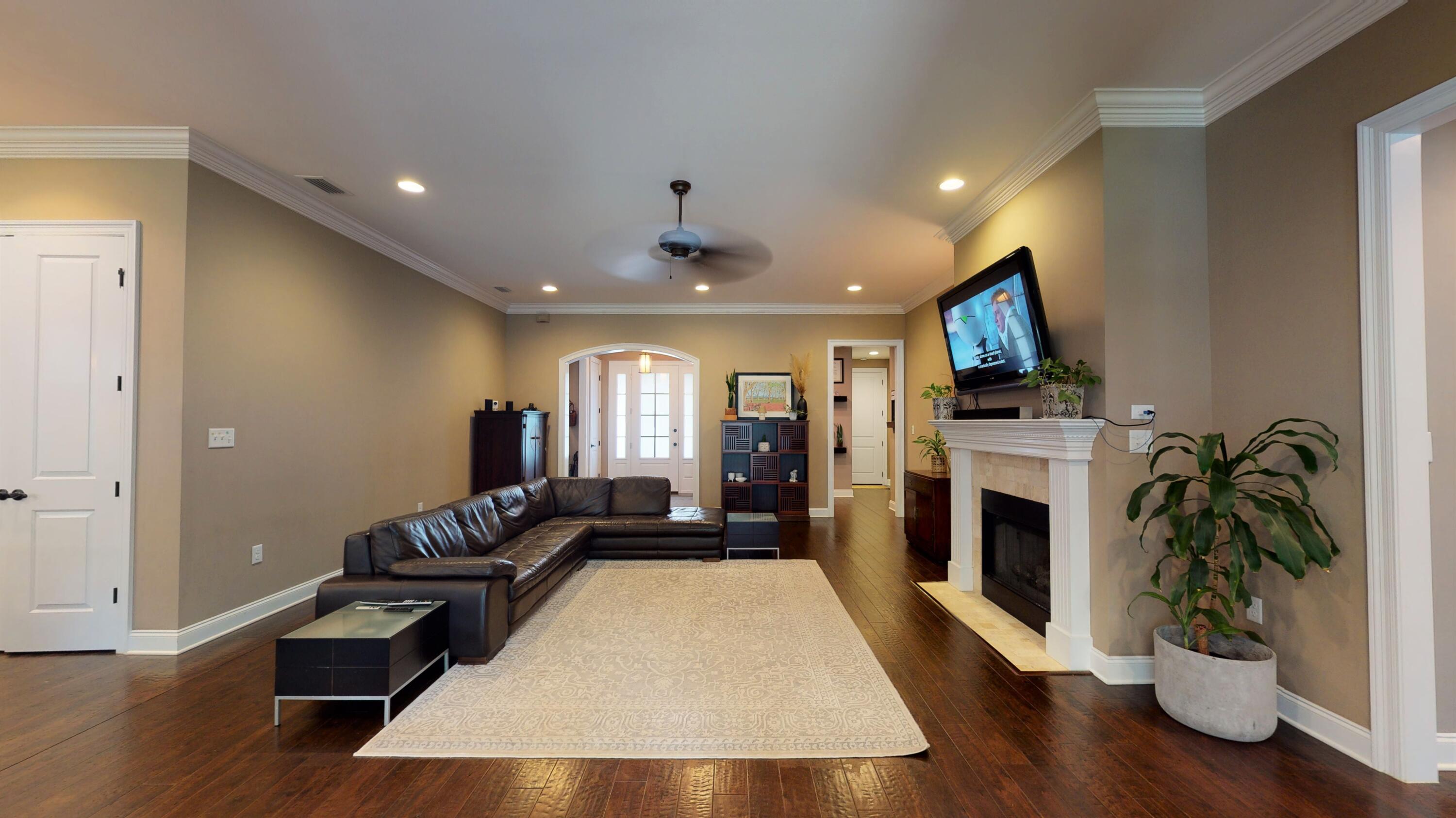 35 Derby Downs Circle Niceville, FL 32578 - Photo 10 of 51 a living room with furniture fireplace and flat screen tv