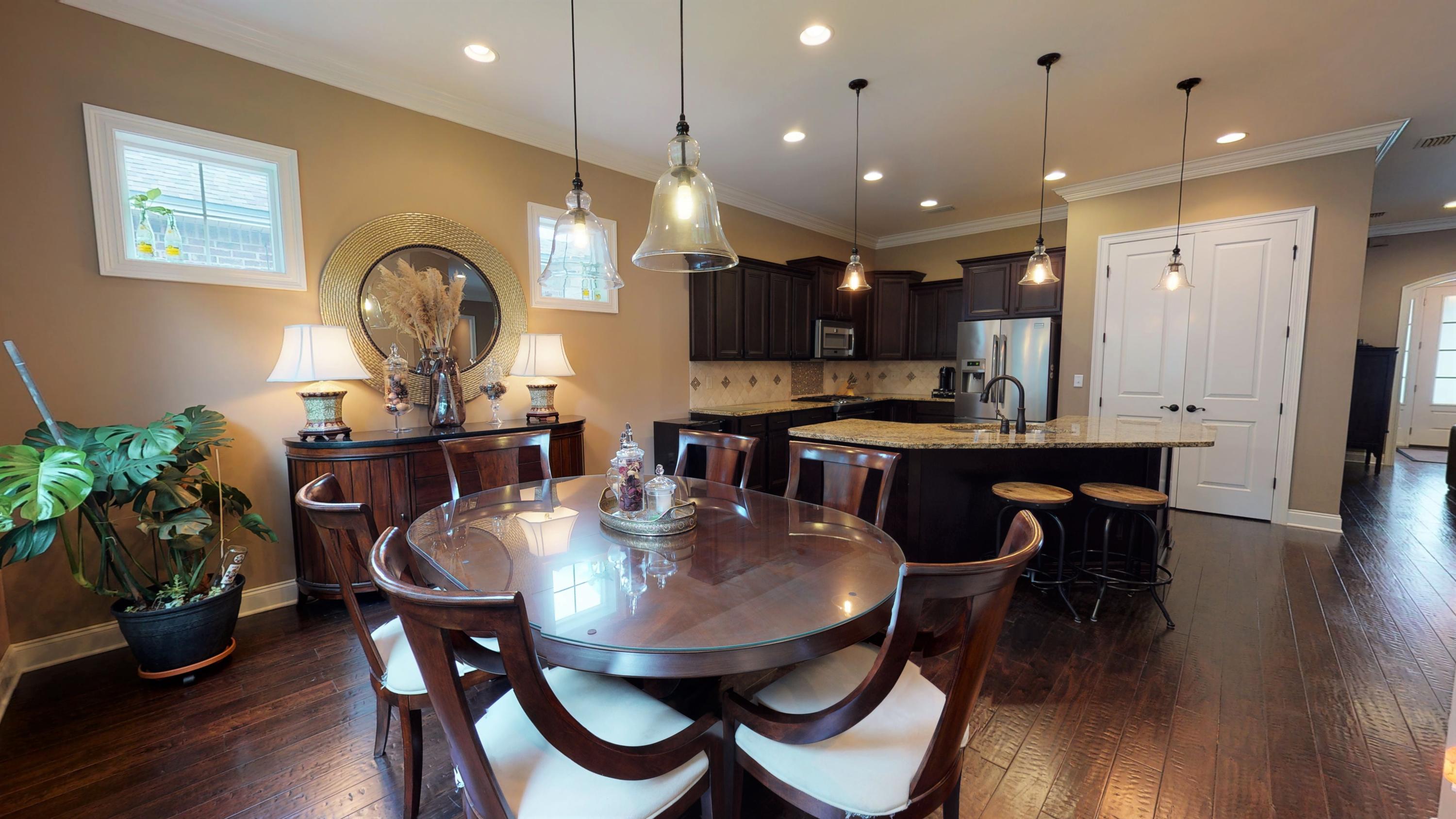 35 Derby Downs Circle Niceville, FL 32578 - Photo 12 of 51 a view of a dining room with furniture and wooden floor