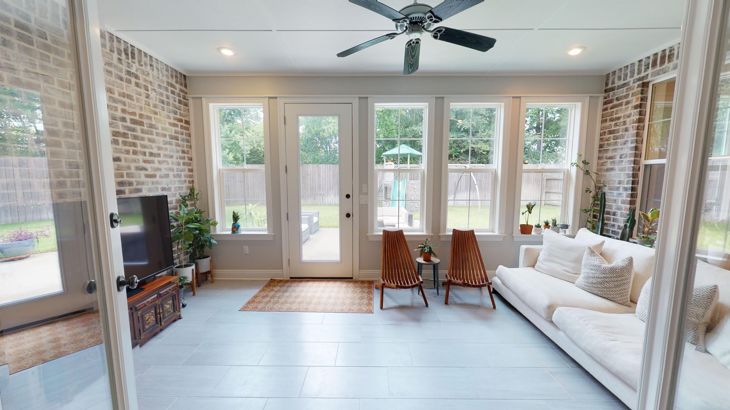 35 Derby Downs Circle Niceville, FL 32578 - Photo 16 of 51 a living room with furniture and a flat screen tv