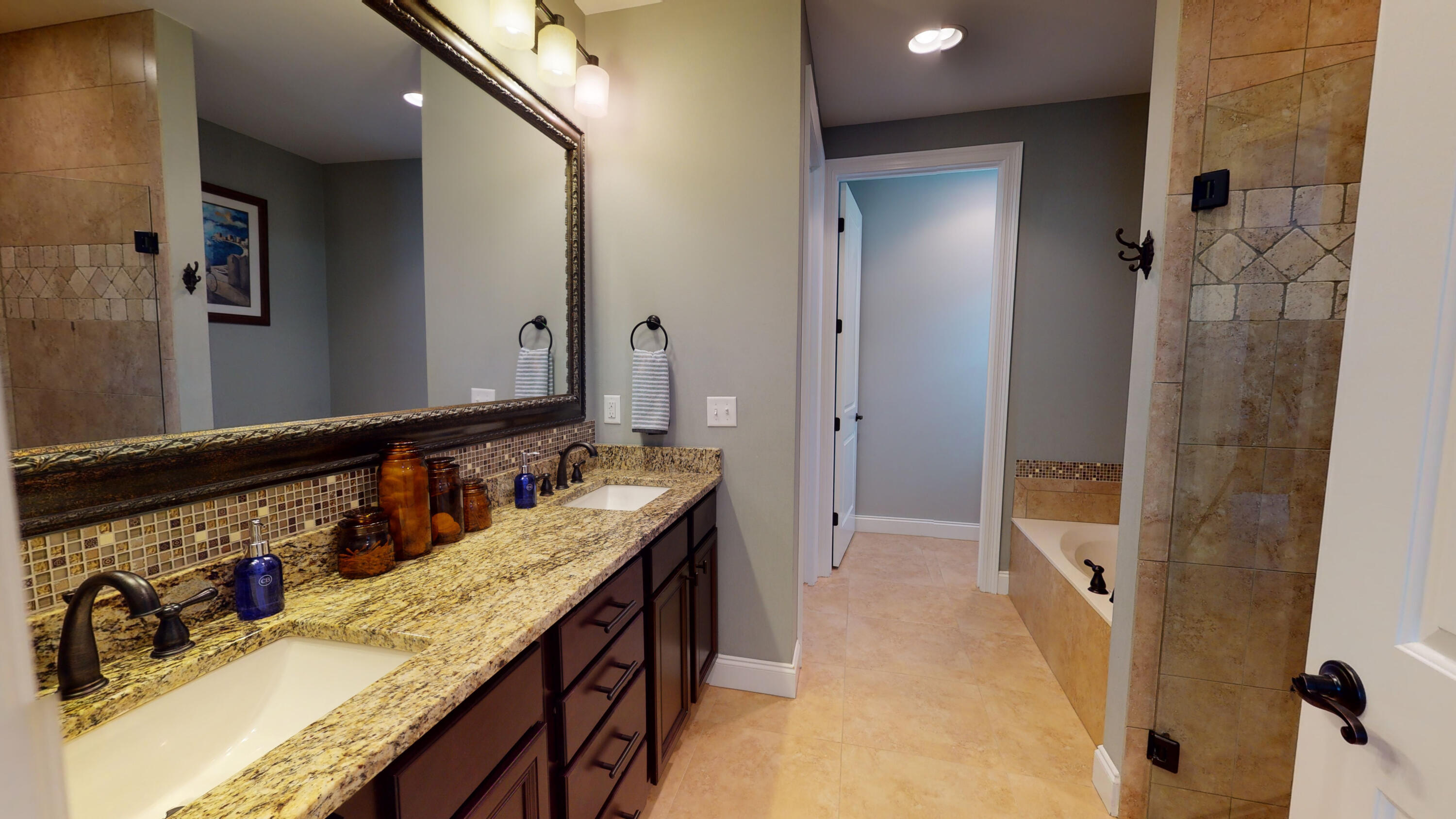 35 Derby Downs Circle Niceville, FL 32578 - Photo 21 of 51 a bathroom with a granite countertop double vanity sink and mirror