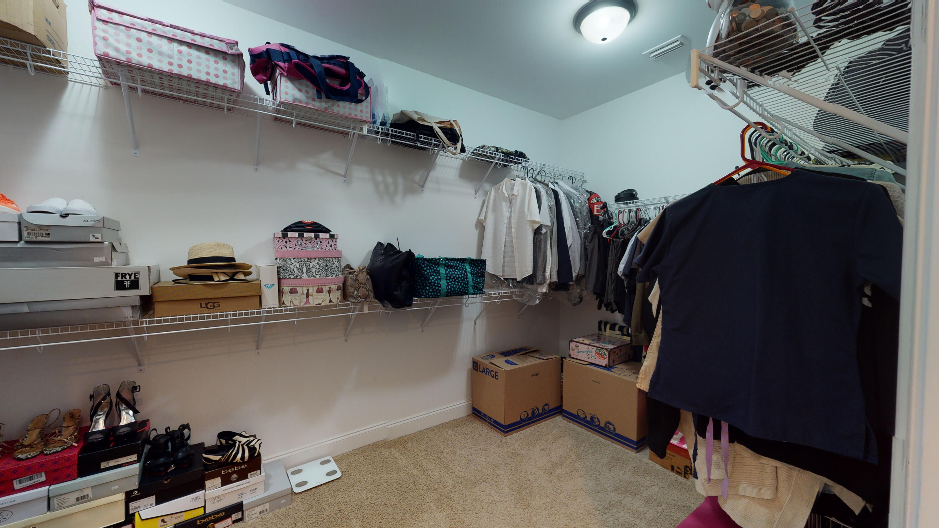 35 Derby Downs Circle Niceville, FL 32578 - Photo 23 of 51 a view of walk in closet with clothes and shoes