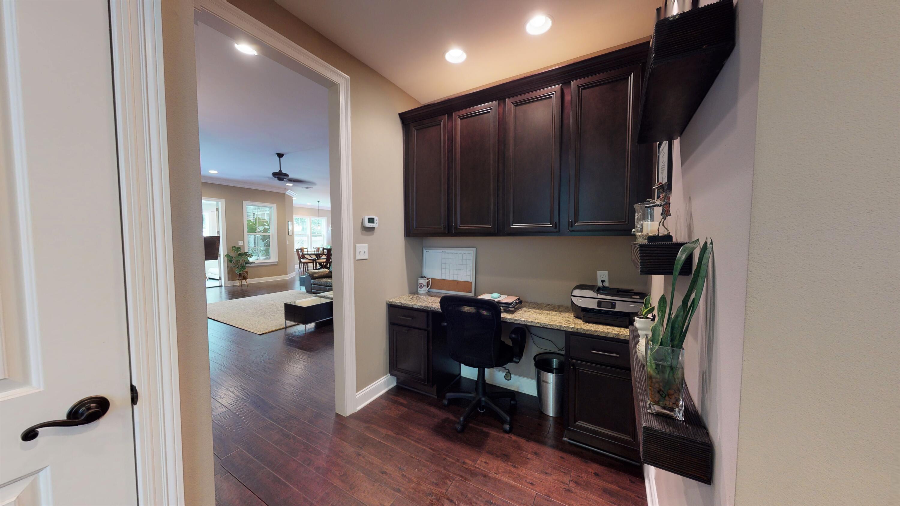 35 Derby Downs Circle Niceville, FL 32578 - Photo 25 of 51 a view of a workspace with furniture and wooden floor
