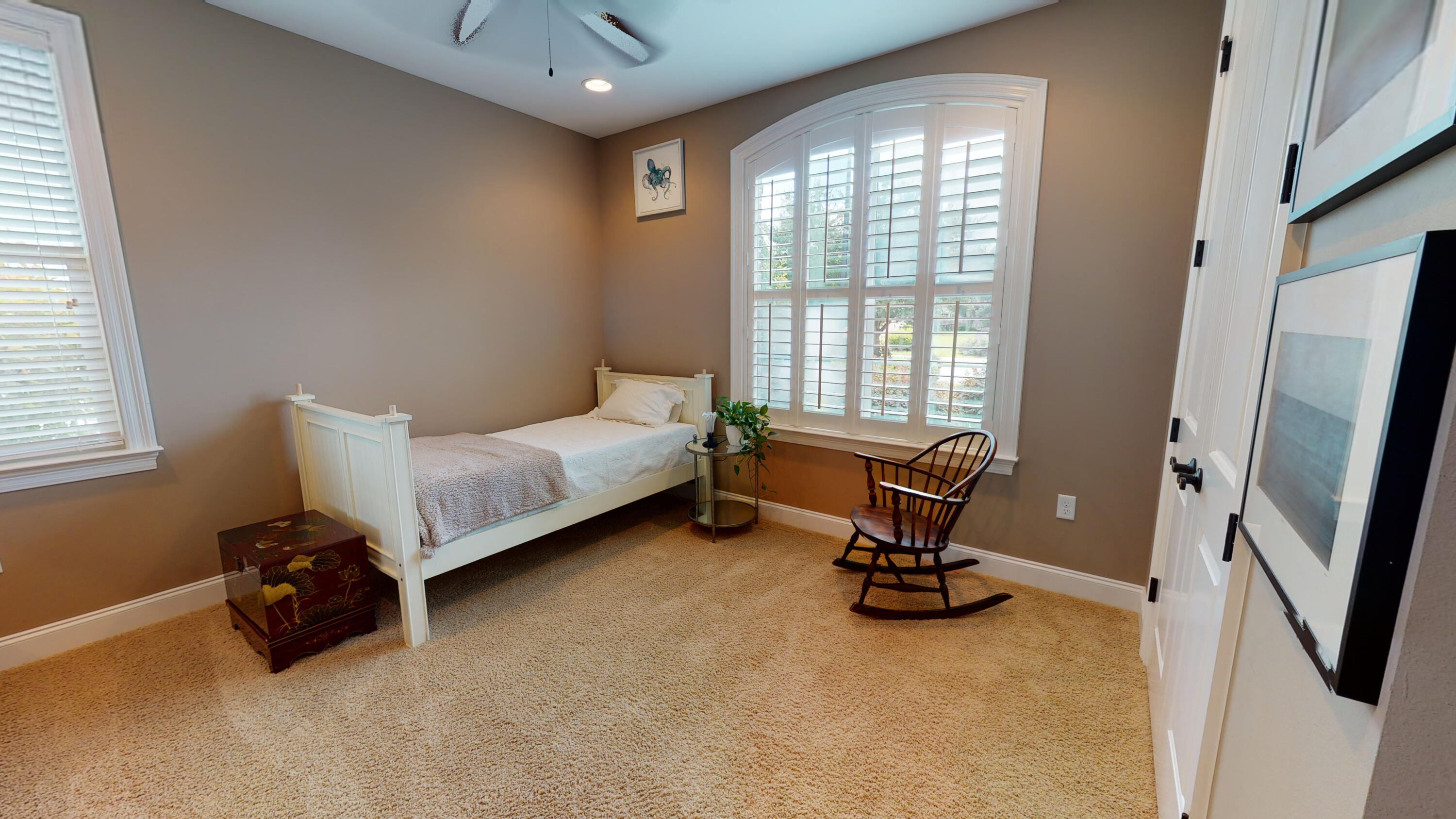 35 Derby Downs Circle Niceville, FL 32578 - Photo 30 of 51 a room with a bed and a desk