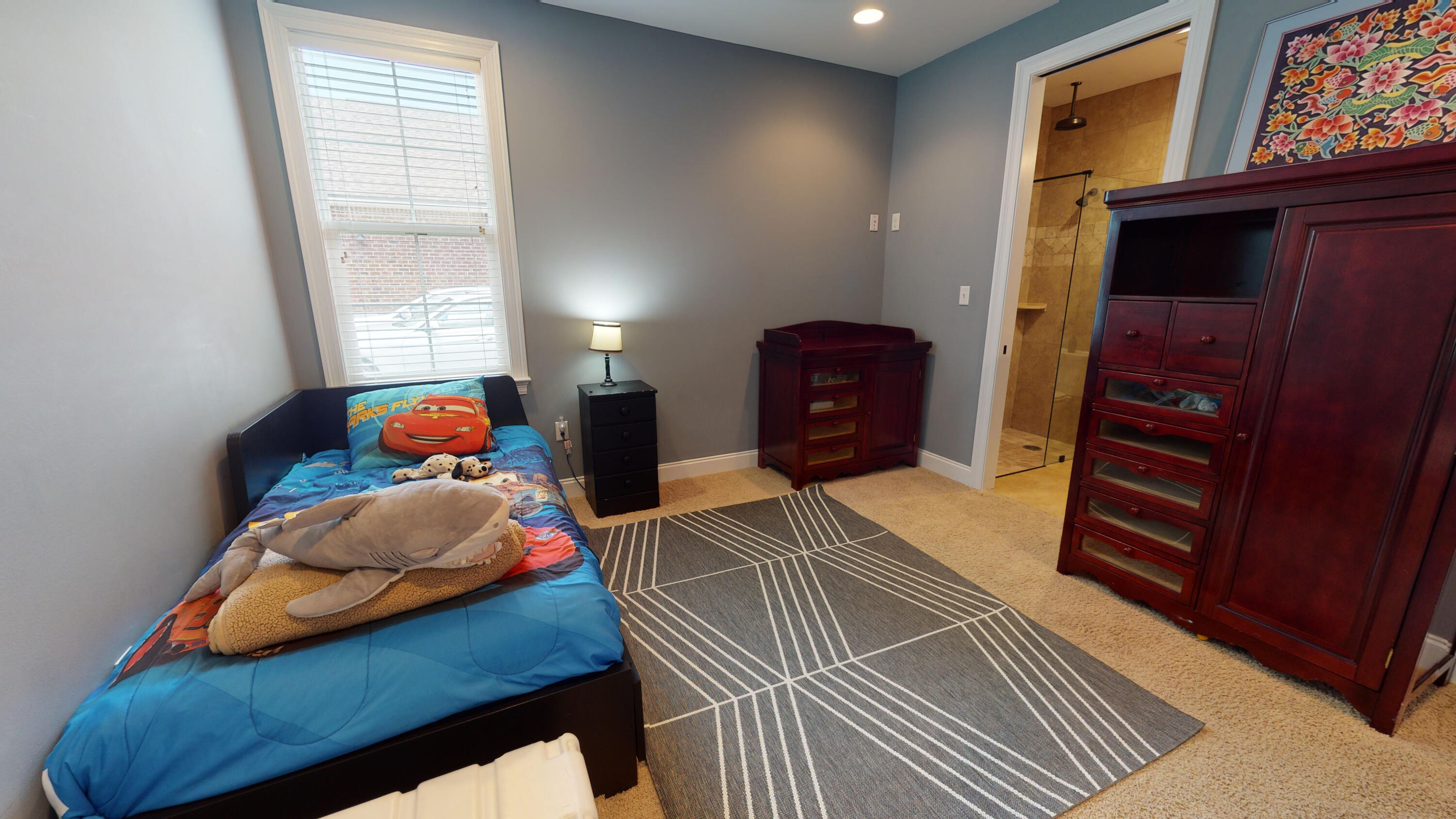 35 Derby Downs Circle Niceville, FL 32578 - Photo 32 of 51 a bedroom with a bed and wooden floor