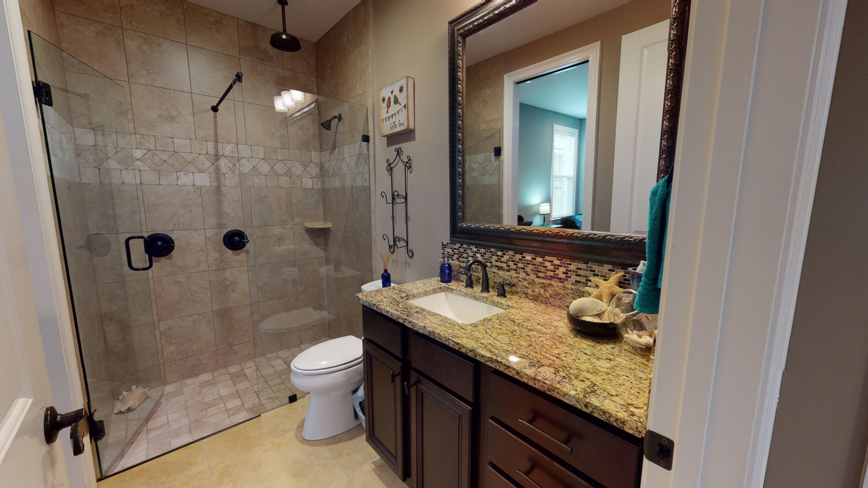 35 Derby Downs Circle Niceville, FL 32578 - Photo 33 of 51 a bathroom with a granite countertop sink a toilet and shower