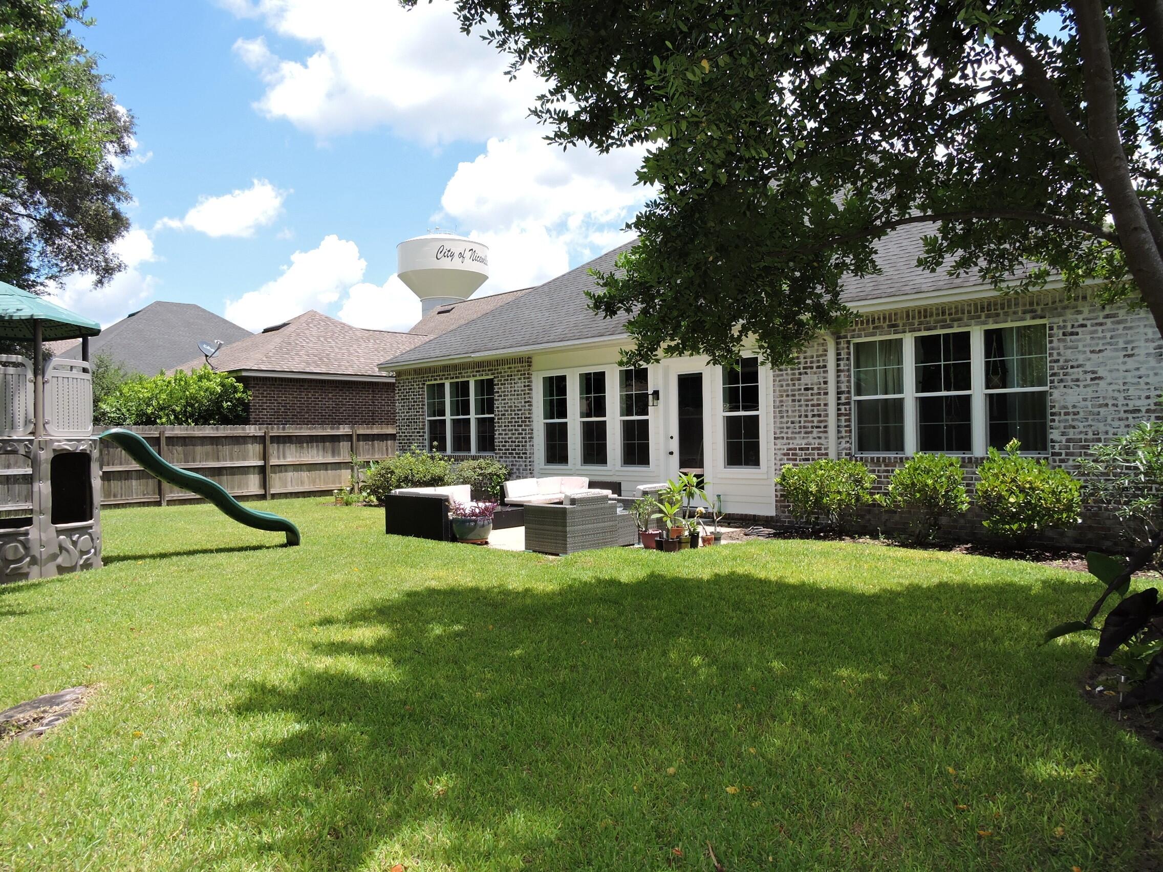 35 Derby Downs Circle Niceville, FL 32578 - Photo 35 of 51 a view of a house with backyard porch and sitting area