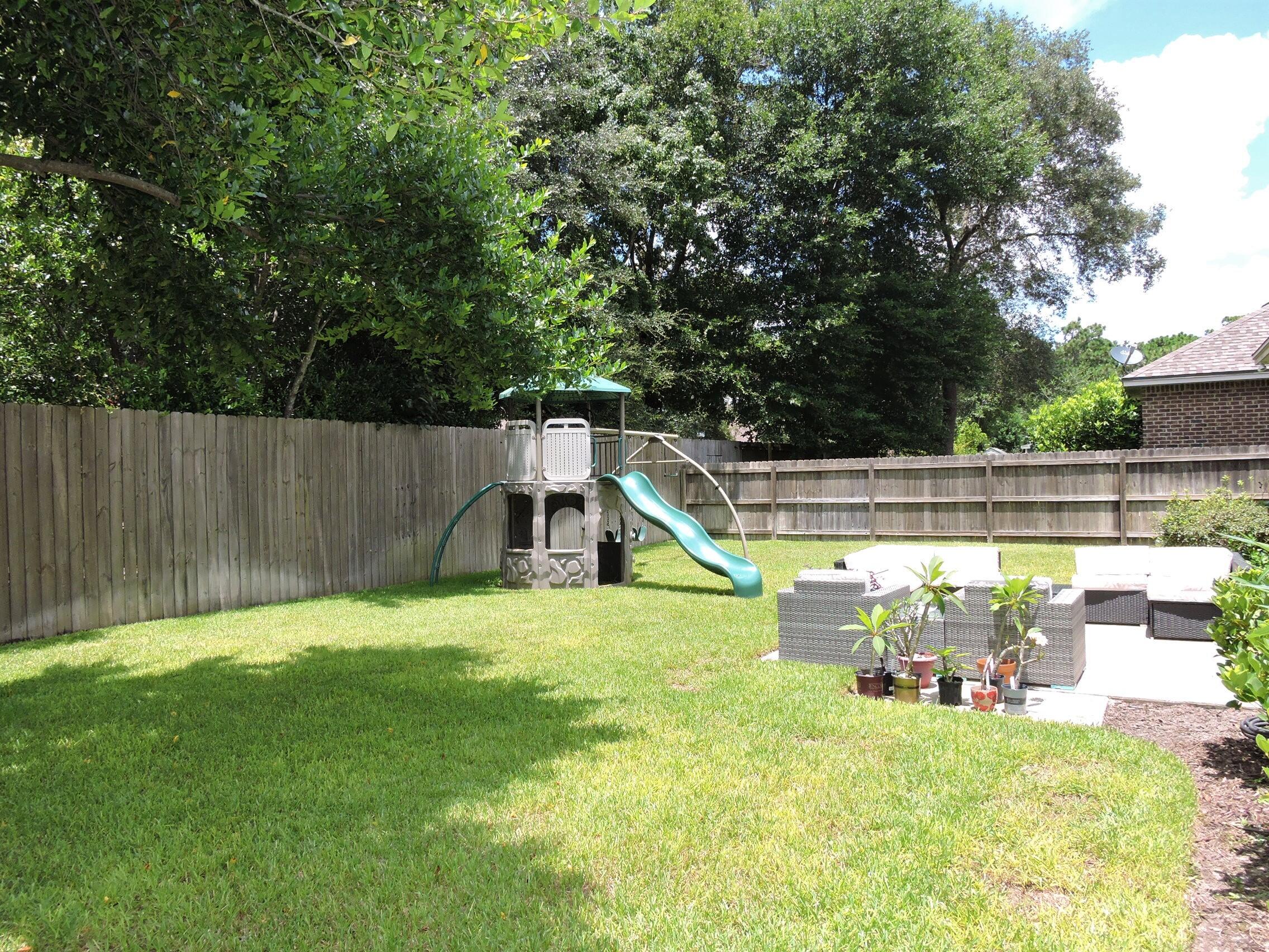 35 Derby Downs Circle Niceville, FL 32578 - Photo 36 of 51 a view of backyard with swimming pool