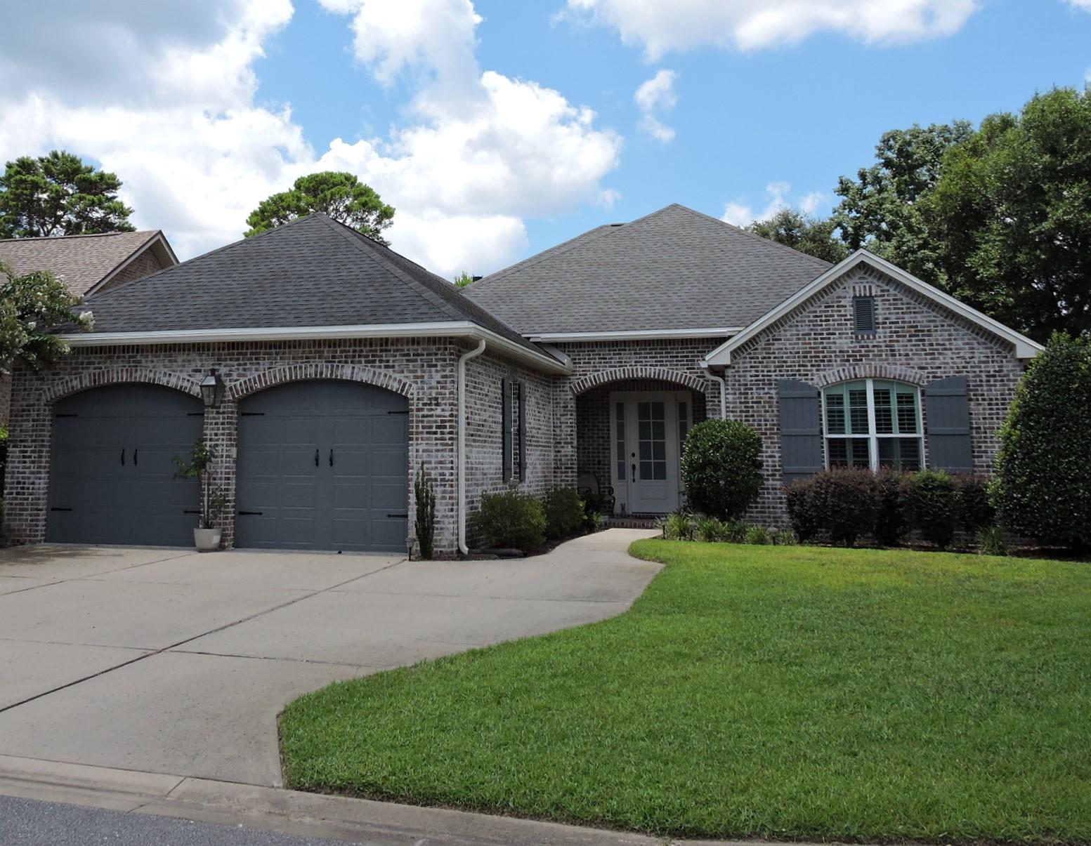 35 Derby Downs Circle Niceville, FL 32578 - Photo 39 of 51 a front view of a house with a yard and garage